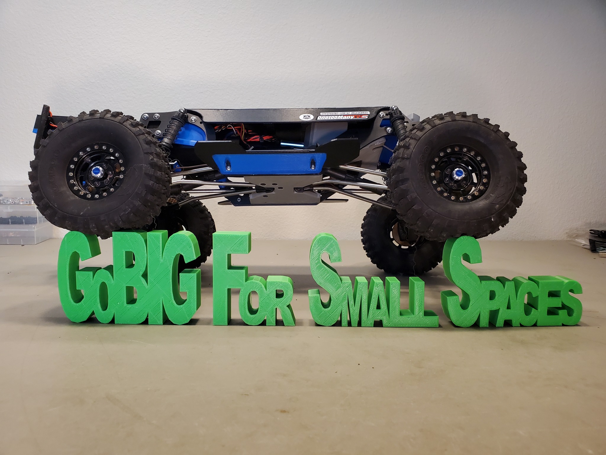 The actual BIGCrawler BarNone inspection vehicle above green Go BIG for Small Spaces lettering